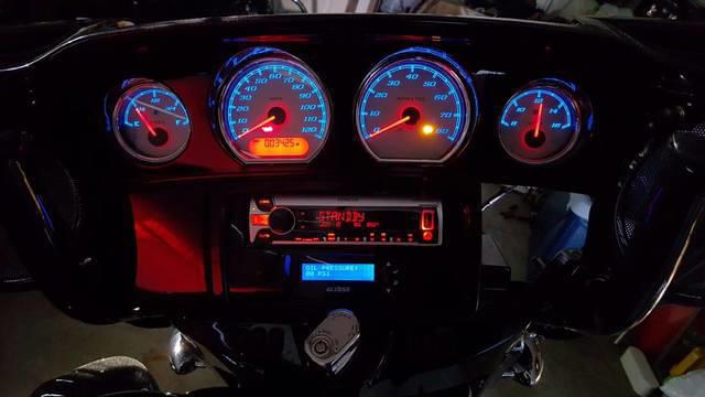 Blue w/Red needles and Red mileage, Silver faced gauges.